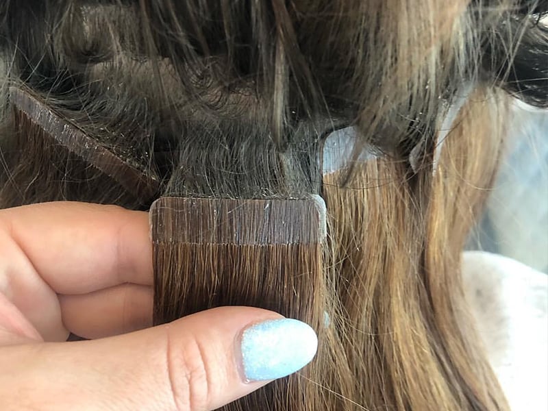 how to re tape hair extensions